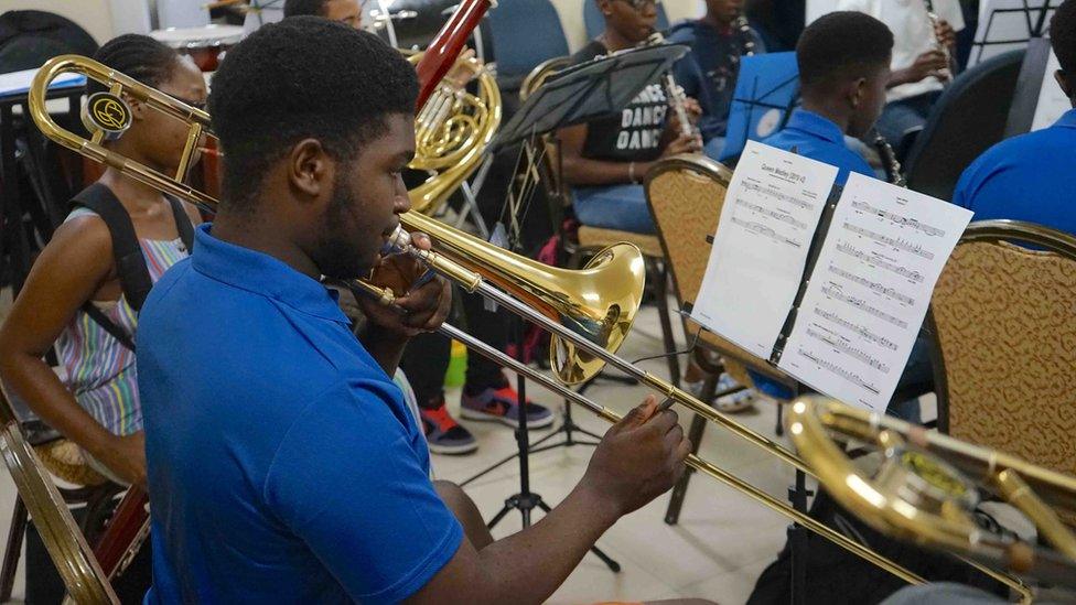 Orlando Gordon during a practice session with the brass section