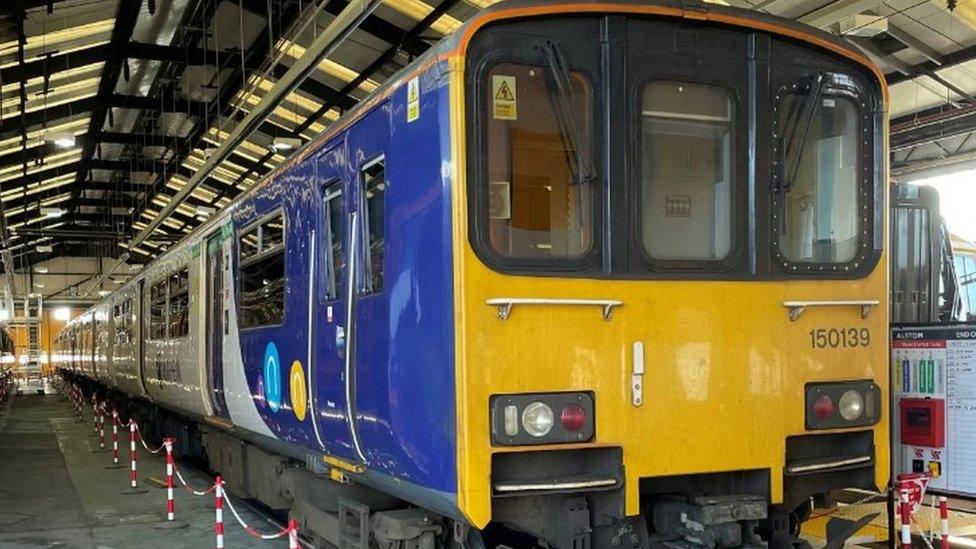 Class 150 trains at a Bletchley depot