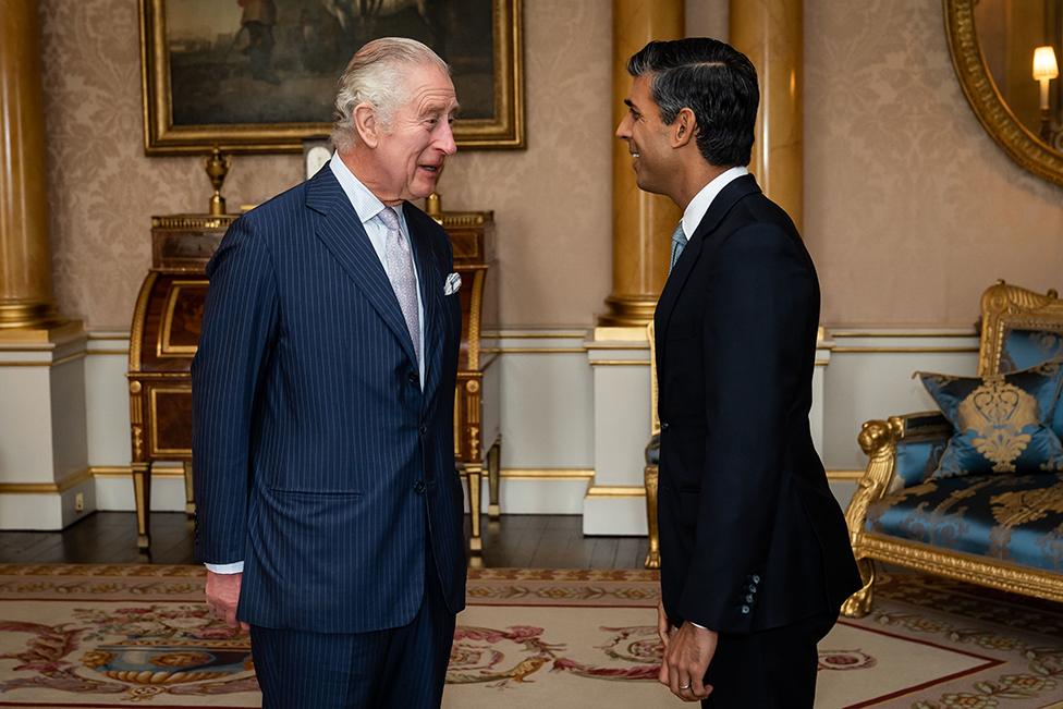 King Charles III welcomes Rishi Sunak during an audience at Buckingham Palace, London, where he invited the newly elected leader of the Conservative Party to become Prime Minister and form a new government on 25 October 2022