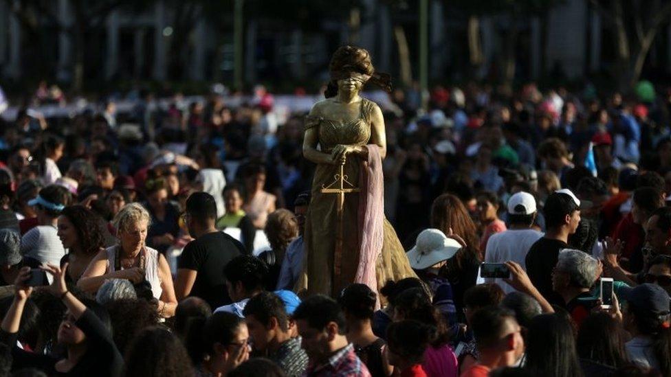 Demonstrators protest at Plaza Mayor in Guatemala City, Guatemala, 11 March 2017.