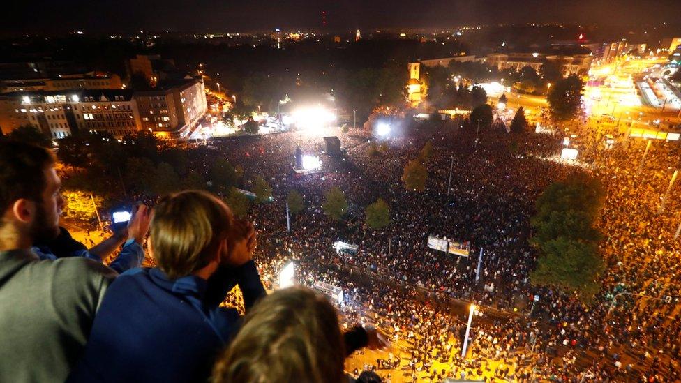 People watch an anti-racism concert in Chemnitz, Germany, 3 September 2018