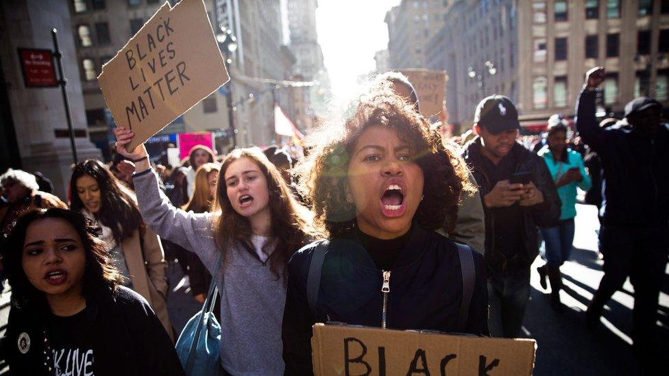 Thousands of protesters march up Fifth Avenue to Trump Tower