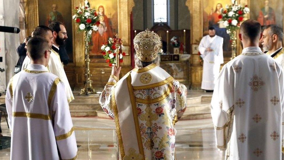 The head of the Bosnian Serb Orthodox Church in Bosnia and Herzegovina conducts an Easter service