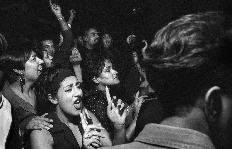 People dancing at Apache Indian concert