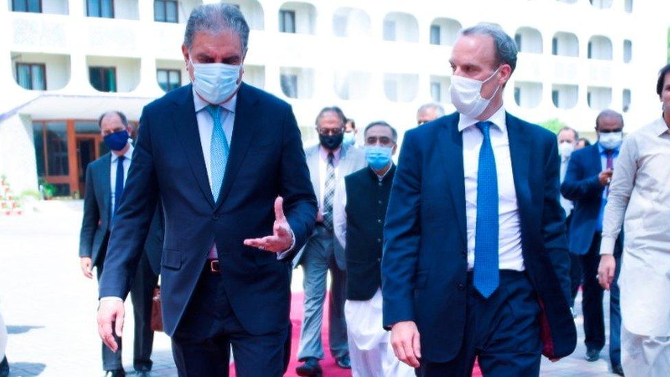 Shah Mahmood Qureshi and Dominic Raab