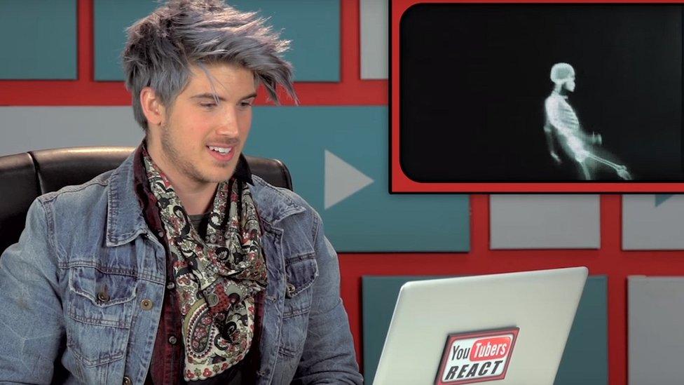 Joey Graceffa watching a YouTube video