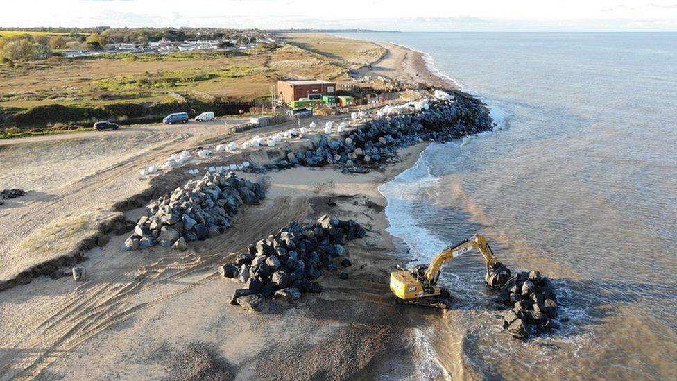 Coastline being shored up with rocks