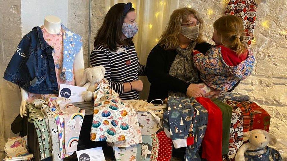 Karen Williams (centre) on her stall