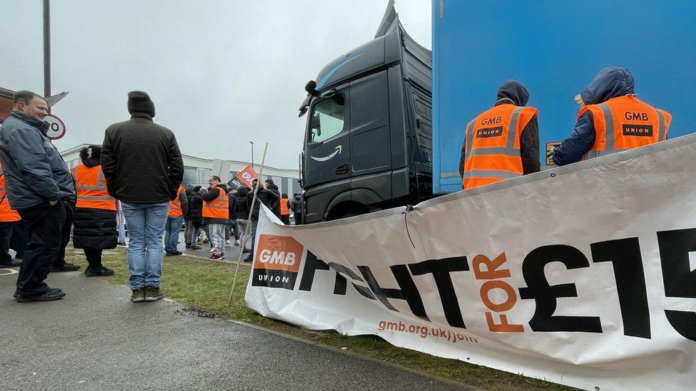 Workers outside Amazon centre