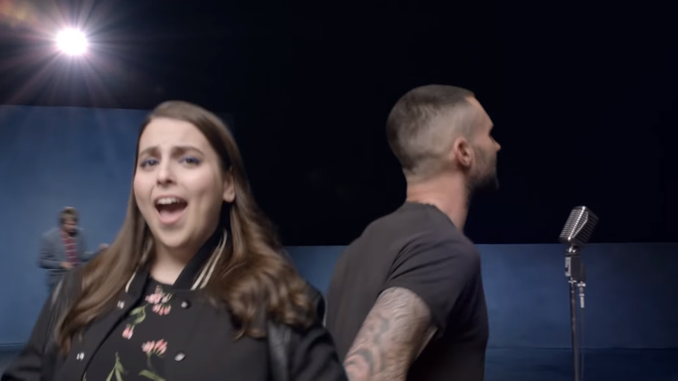 Beanie Feldstein and Adam Levine