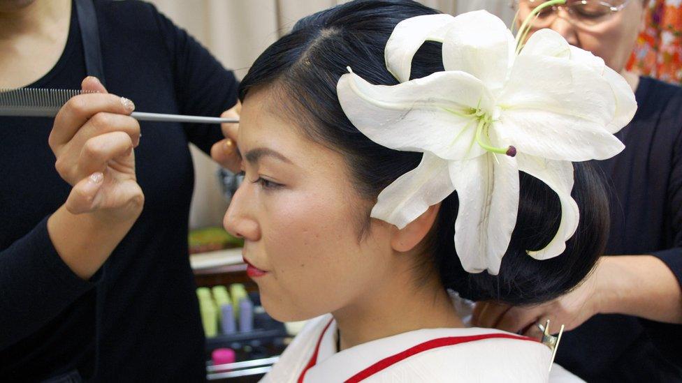 Bride being made up