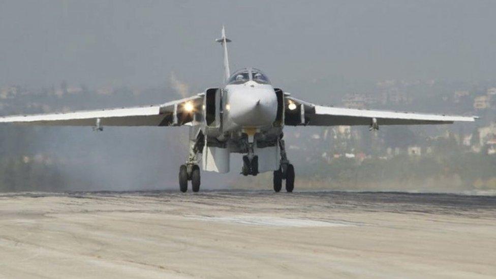 A Russian Sukhoi Su-24 fighter jet lands at the Hmeymim air base near Latakia, in Syria (07 November 2015)