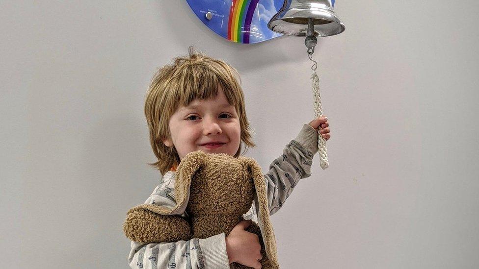 Kip Freshwater rings the bell at Birmingham Children's Hospital to mark the end of his treatment before he relapsed