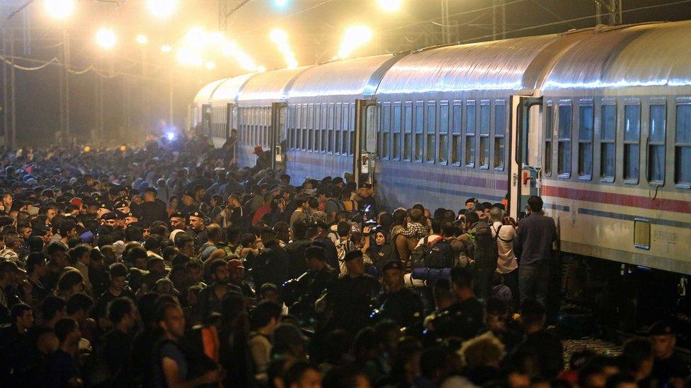 People board train at Tovarnik on Serbian-Croatian border - 18 September