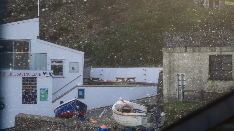 Sea foam blowing in to St Agnes