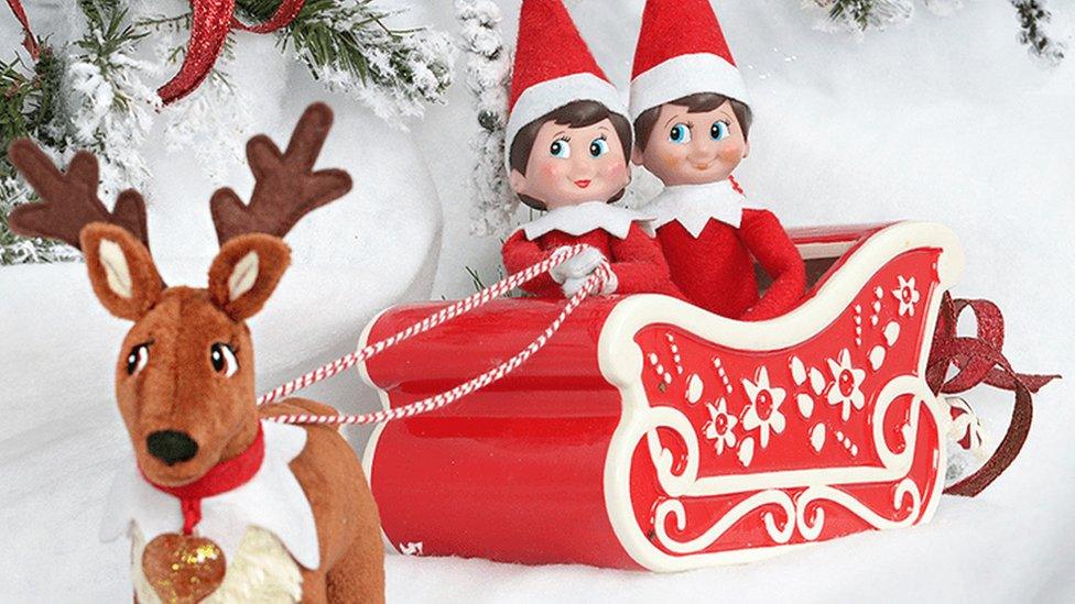 Elf on a Shelf in a sleigh