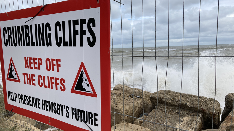 A warning sign telling people to keep off the cliffs at Hemsby, Norfolk