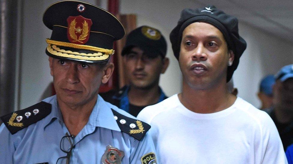 Retired Brazilian footballer Ronaldinho arrives to face a judge at a court in the Paraguayan capital, Asuncion, 7 March 2020