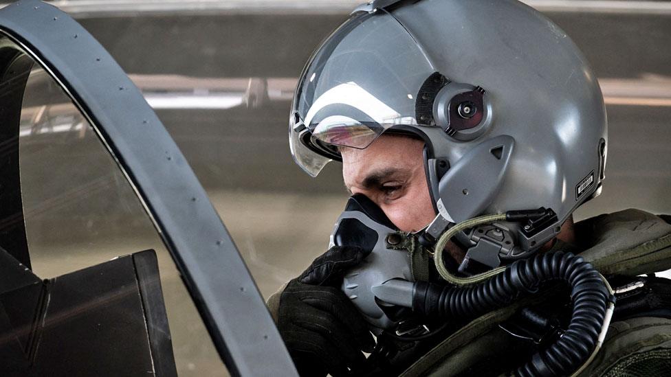 French fighter jet pilot gets ready in his aircraft