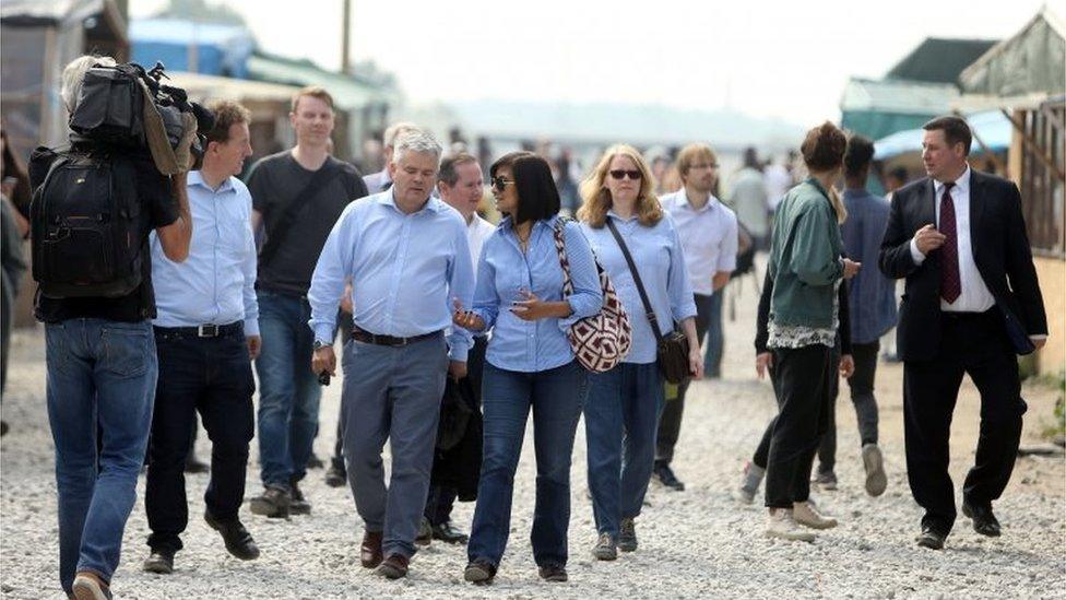 Councillors from the Local Government Association (LGA) view the 'Jungle Camp' near Calais as British authorities travelled to the French town for talks with their French counterparts on how best to tackle the issue of lone migrant children.