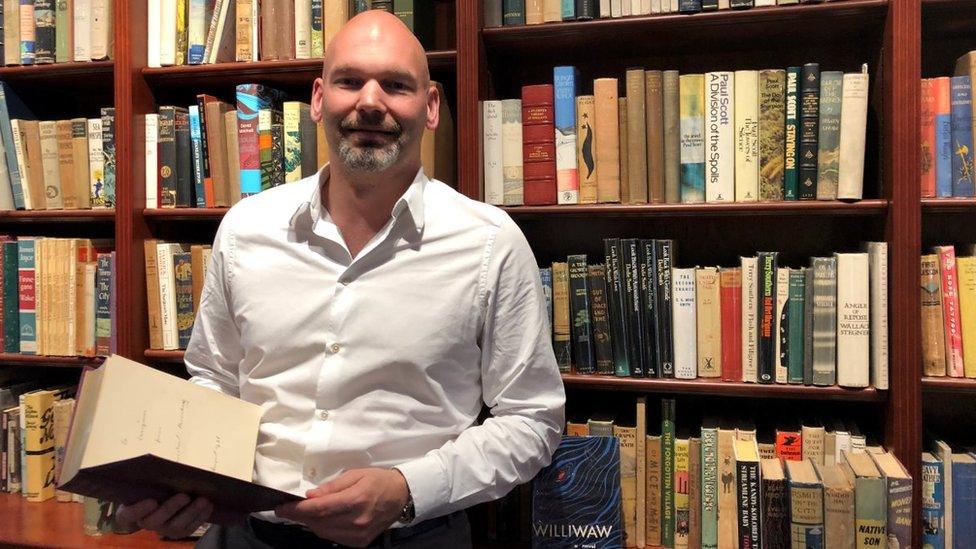 Pom Harrington with books