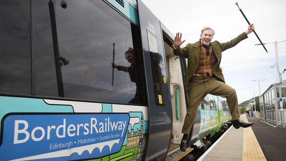 John Fergus McCann as Sir Walter Scott at Tweedbank Railway Station