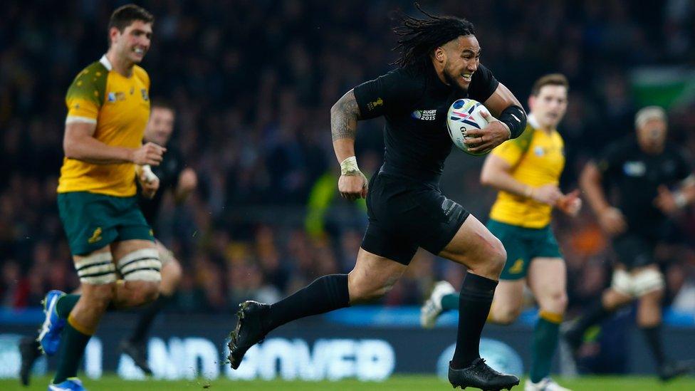 Ma"a Nonu of New Zealand breaks through on his way to score his team"s second try