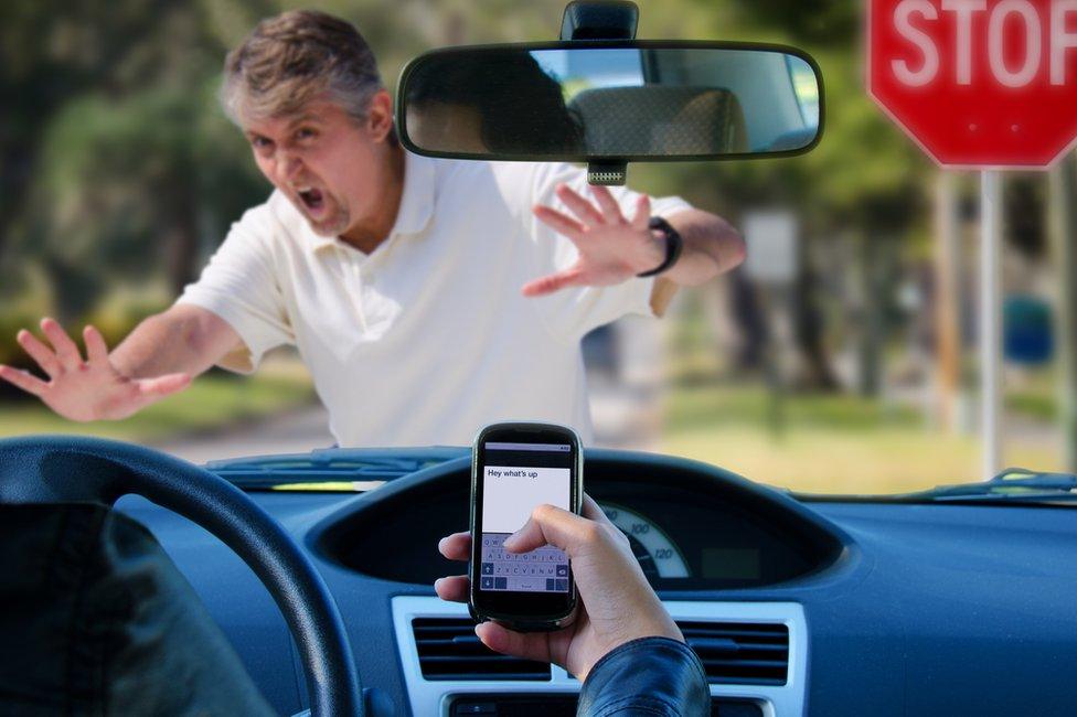 Driver on mobile phone nearly running someone over