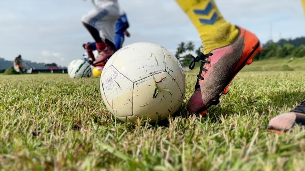 A young unidentified footballer in Gabon