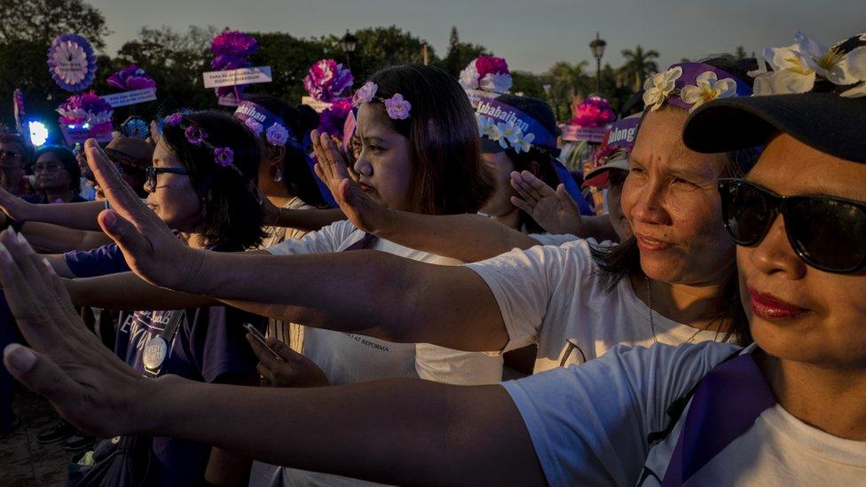 Protesters march on the streets of Manila on International Women's Day on March 8, 2019 in Manila, Philippines.