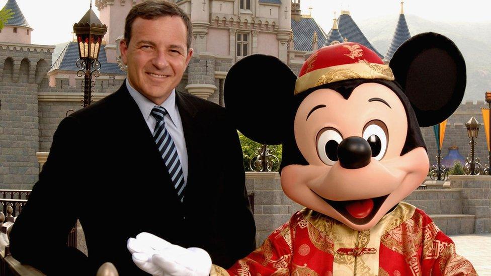 Roger Iger and Mickey Mouse in Hong Kong Disneyland Park