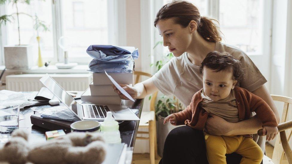 Woman looking a energy bill