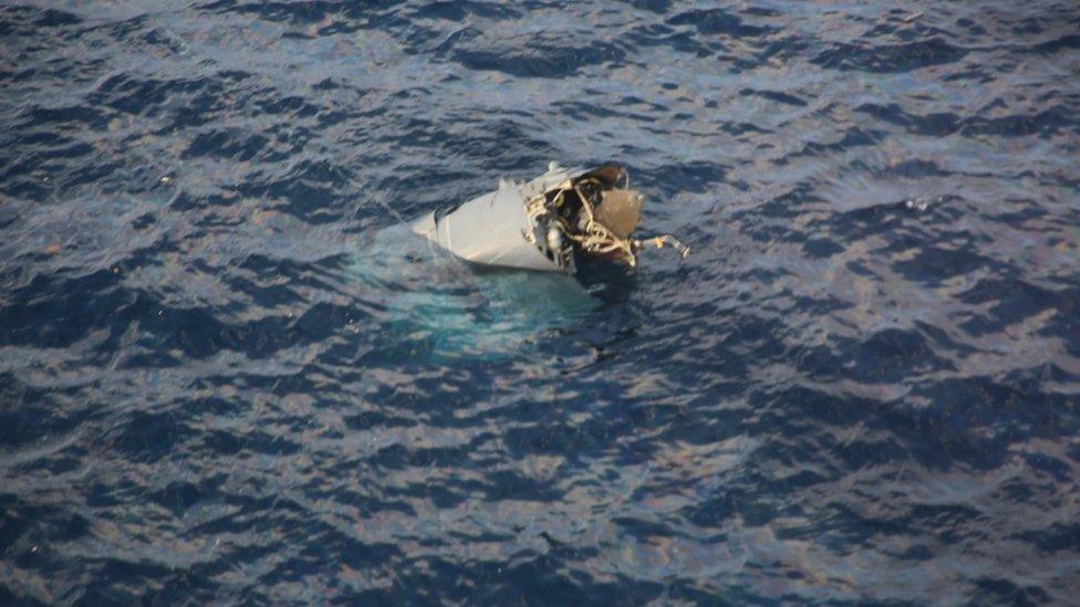 A photo of what is believed to be the wreckage of the crashed plane off south-western Japan