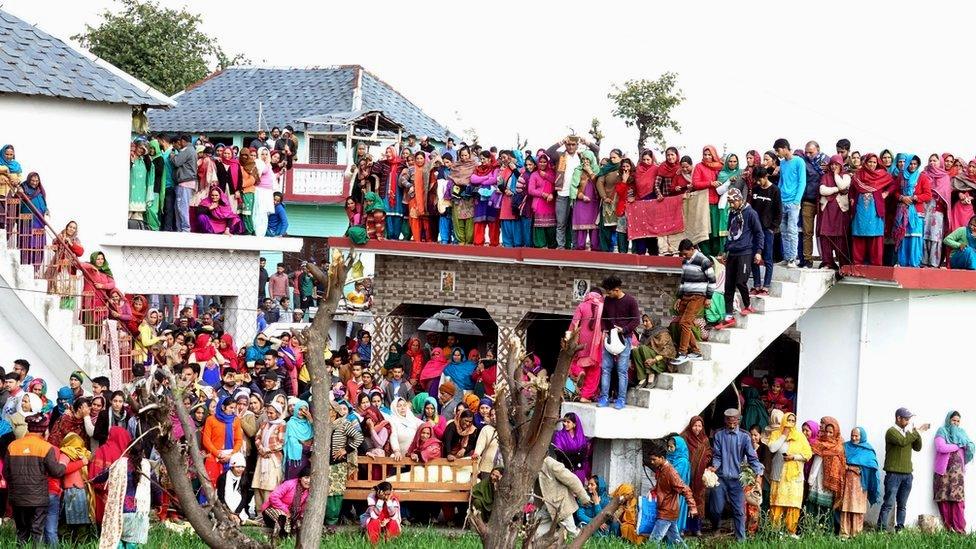 Villagers gather in large numbers as body of slain Central Reserve Police Force (CRPF) soldier Tilak Raj arrives at his home in village Dhewa Jandroh, some 90km from Dharamsala