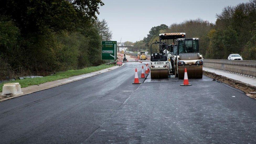 Heavy machinery on newly-resurfaced A11