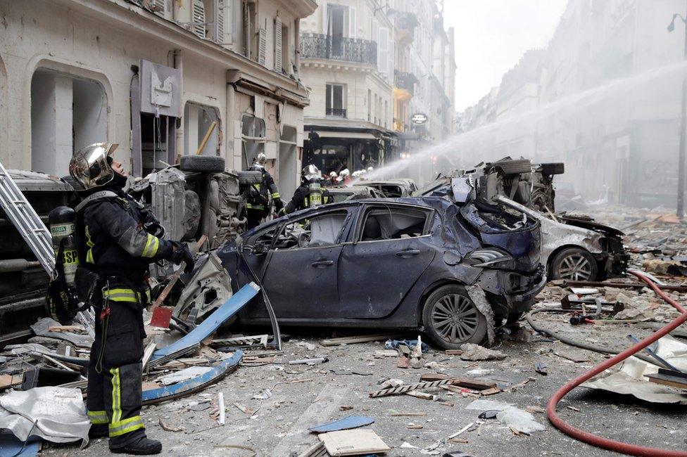 Firefighters tackle the blaze in Paris, 12 January