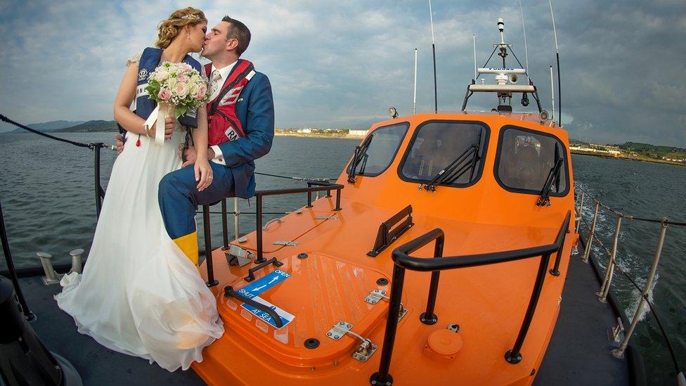 Francis and Helen Burns took their wedding photos beside RNLI lifeboats