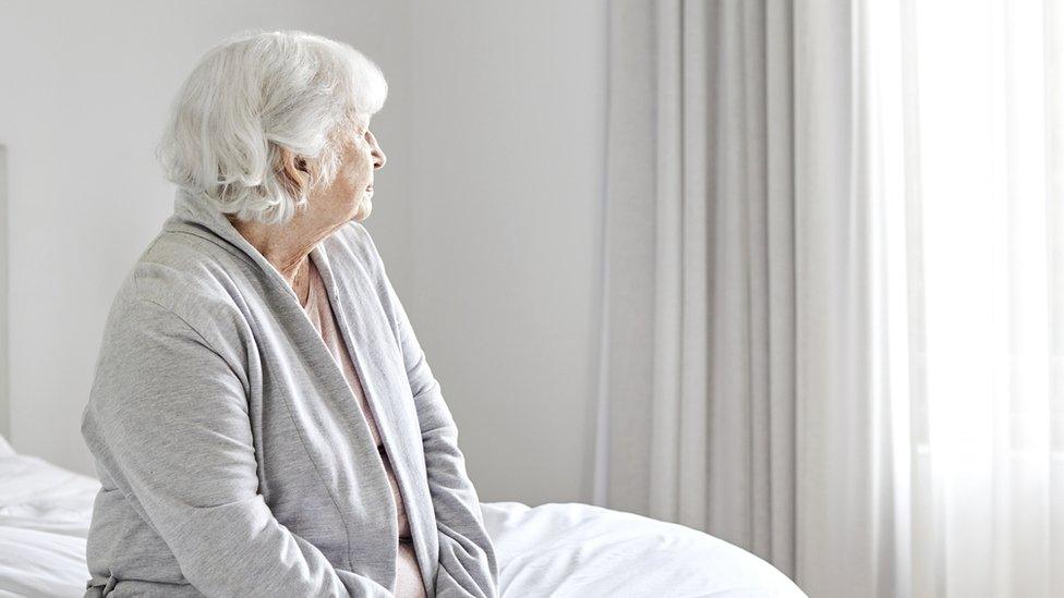 Stock photo of an elderly lady at home