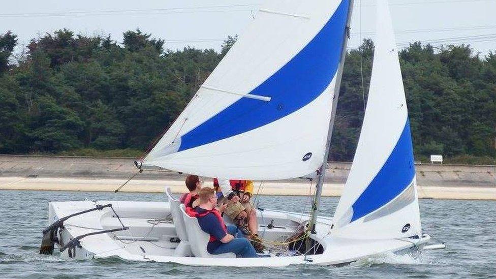 A sailability boat on the water at Hanningfield Reservoir