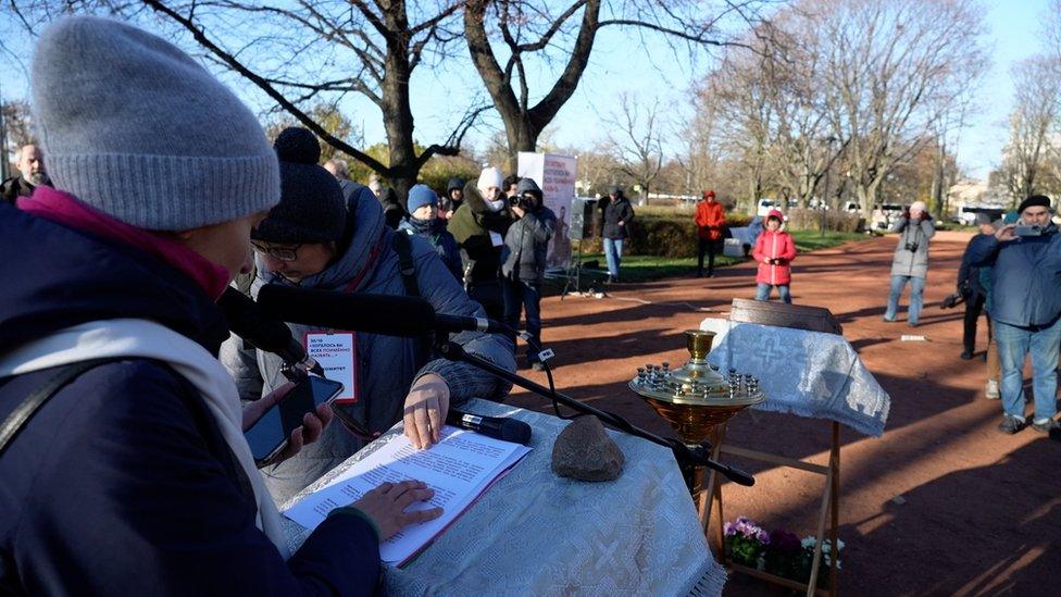 People read out the names of the victims of Stalin