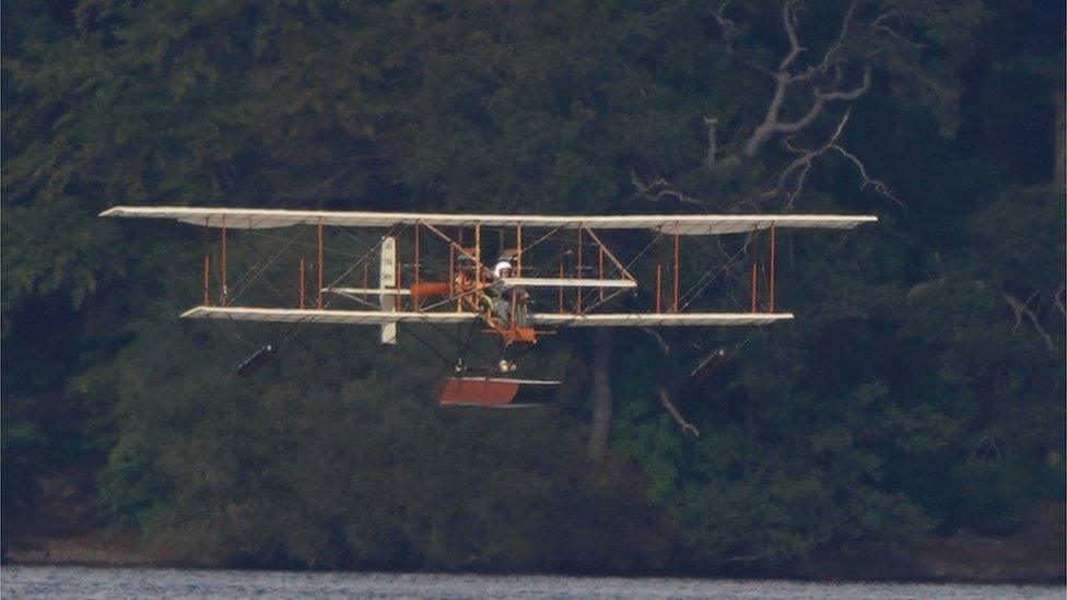 Waterbird flies at Windermere