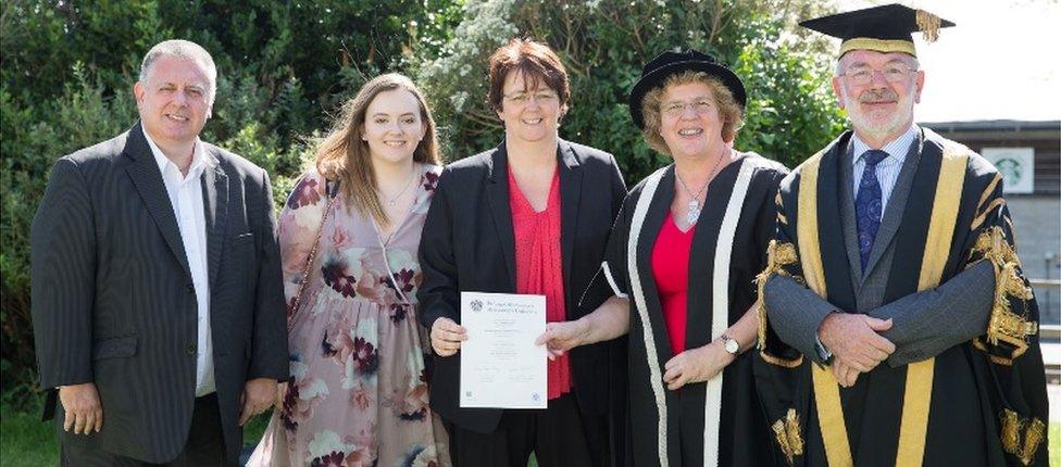 Emily Price's father John, sister Katie and mother Natasha with vice-chancellor Prof Elizabeth Treasure and pro chancellor Glyn Rowlands