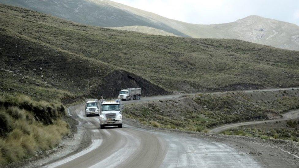 Trucks from the Las Bambas mine circulate along the mining corridor between Sayhua and Capacmarca, near Capacmarca, Peru, January 19, 2022. Picture taken January 19, 2022.