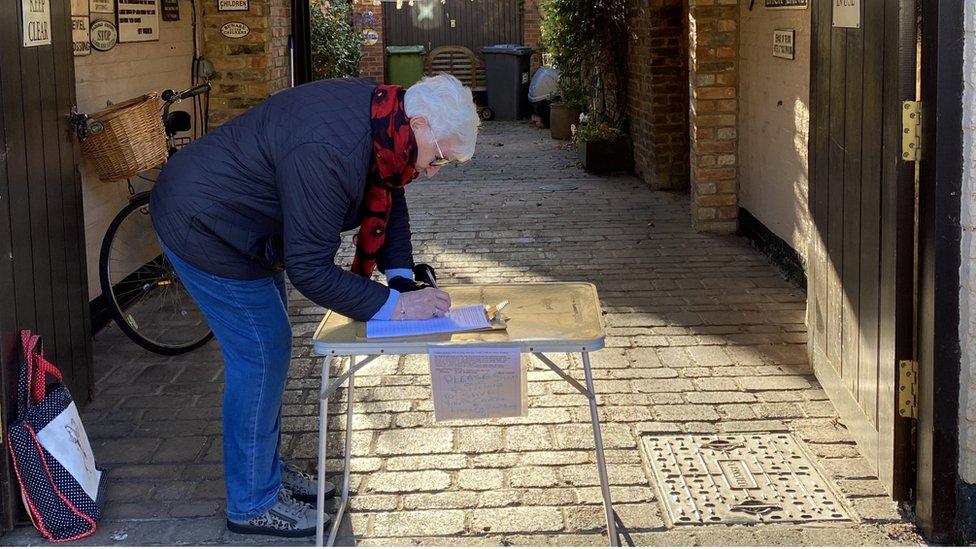 resident signing the petition