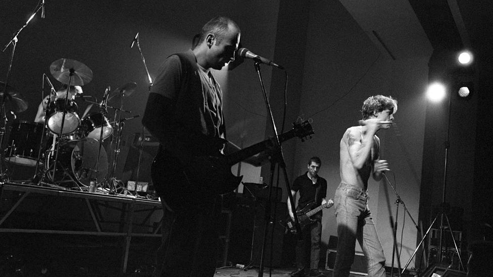 The punk band Camera Silens on stage in 1984 (the singer Gilles Bertin on the right of the photo)