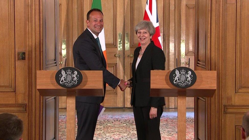 Varadkar and May shaking hands