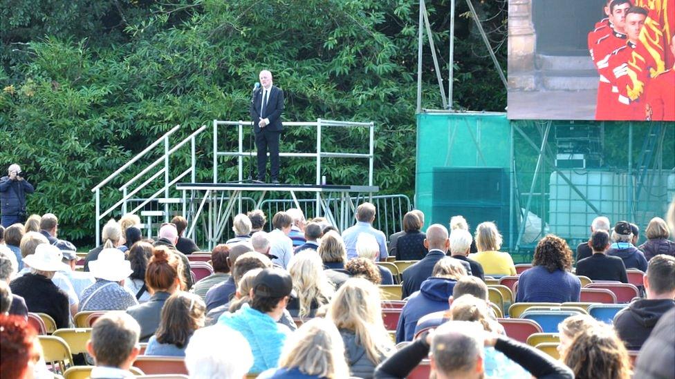 Deputy Peter Ferbrache addressing crowd in Guernsey's Saumarez Park