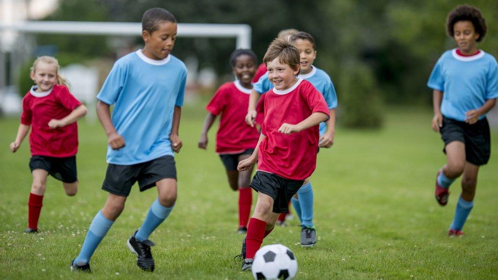 children-playing-football