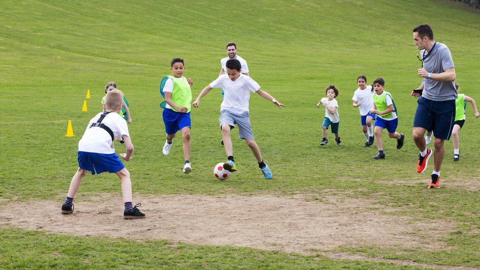 children-playing-football.