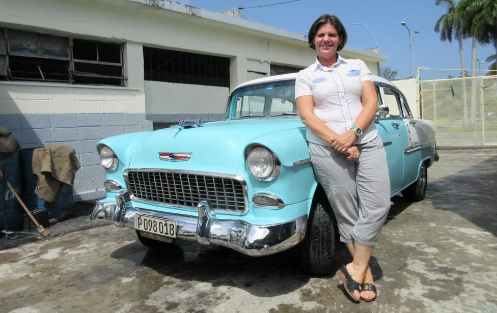 Nidialys with one of her classic cars